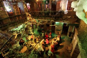 Inside of one of the biggest ruin pub of Budapest with all kinds of crazy and unique decoration