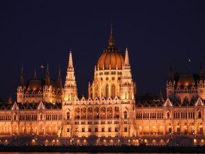 Caption of the Hungarian Parliament building lit up at night