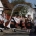 Hungarian youngsters on the countryside performing an Easter tradition, boys pouring water on girls from a bucket