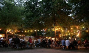 Evening picture of Kertem, an atmospheric garden bar in the City park on the Pest side of Budapest