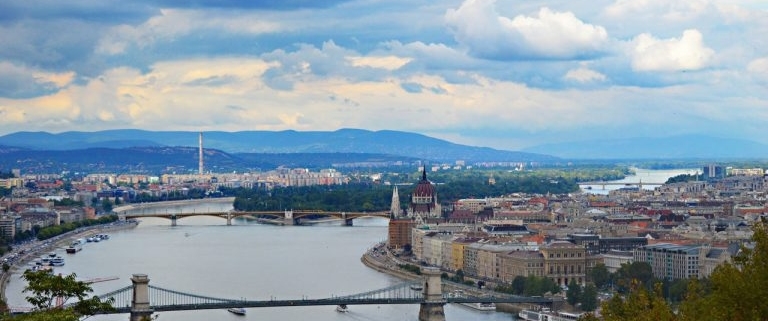 This is a beautiful view of Budapest and the river Danube from the top of the circa 150 meters tall Gellért hill in Buda