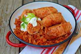 Rolls of Töltött káposzta or Stuffed cabbage in English, which is a cabbage roll filled with a mixture of minced meat, rice and spices