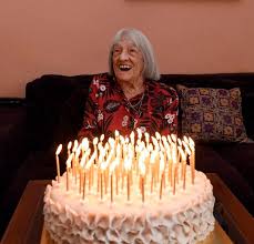 The hundred year old Ágnes Keleti, the world's oldest living Olympic champion with her birthday cake on the 9th of January