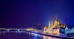 Beautiful image of the lit up Hungarian Parliament building and the river Danube